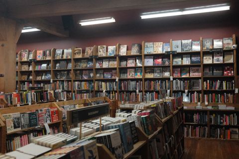 The cavernous interior of Elliot Bay Book Company, rows of shelves stretching back.