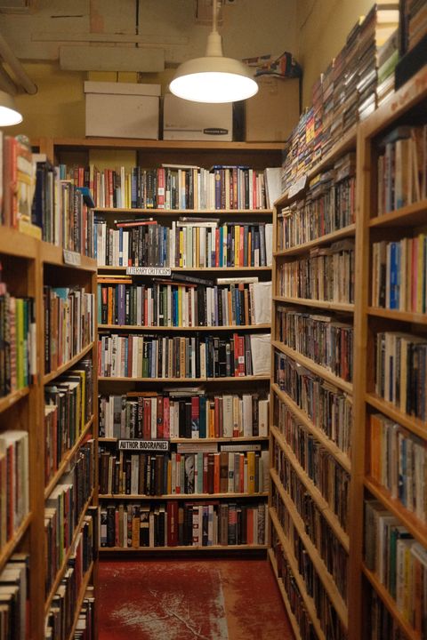 The interior of Lamplight Books, full of second hand shelves.