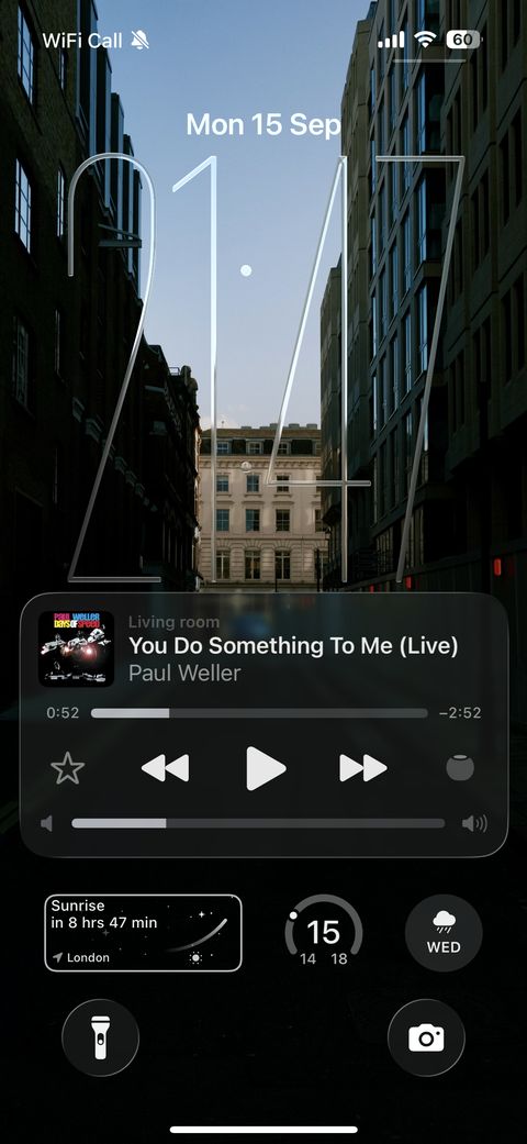 Screenshot of ios26 where there's a long clock on the Home Screen