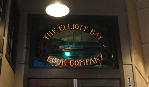 The stained glass window above the entrance of Elliot Bay Book Company.